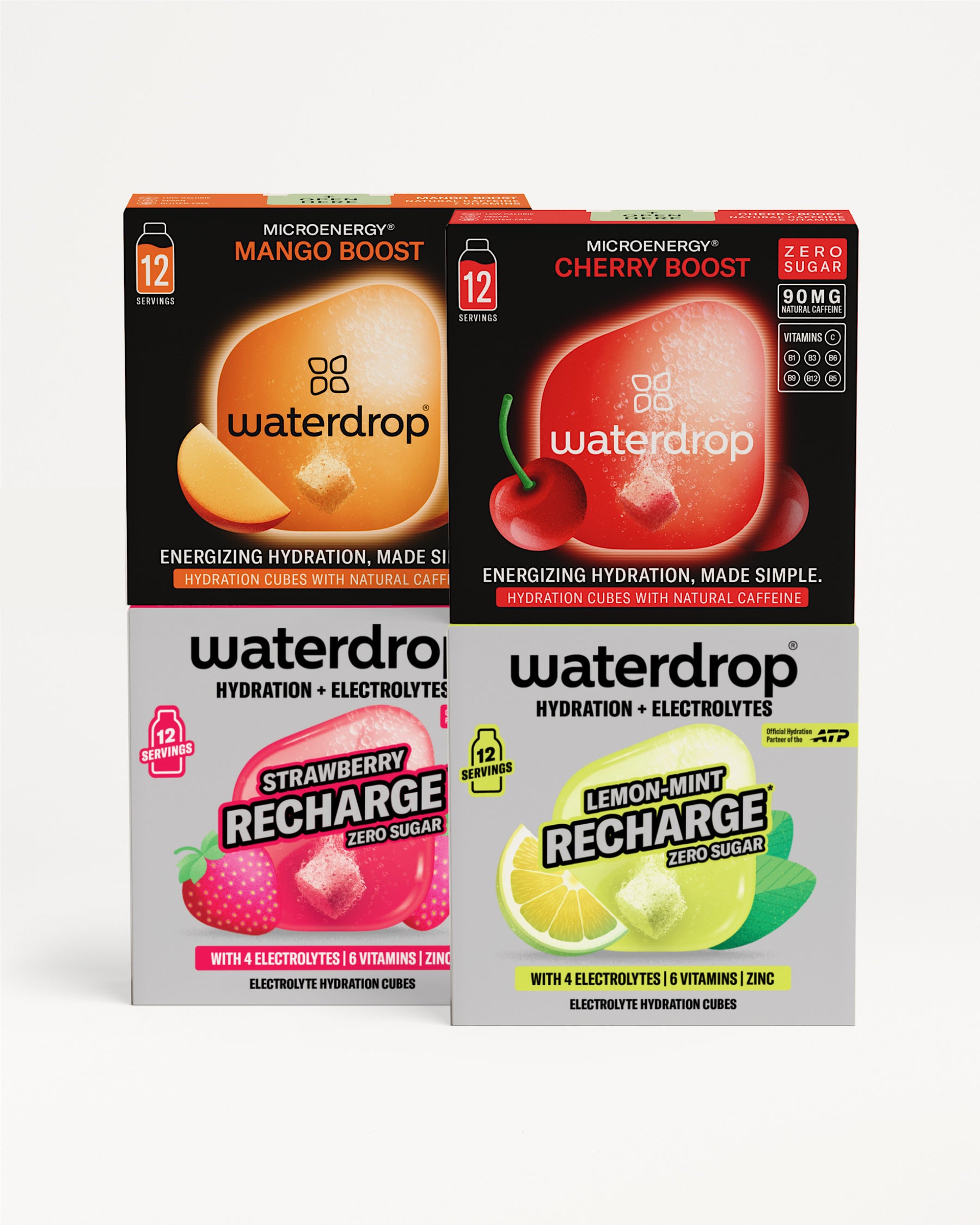 Négy waterdrop doboz: Microenergy Mango Boost, Microenergy Cherry Boost, Recharge Strawberry és Recharge Lemon-Mint, dobozonként 12 adaggal, fehér háttéren elrendezve.