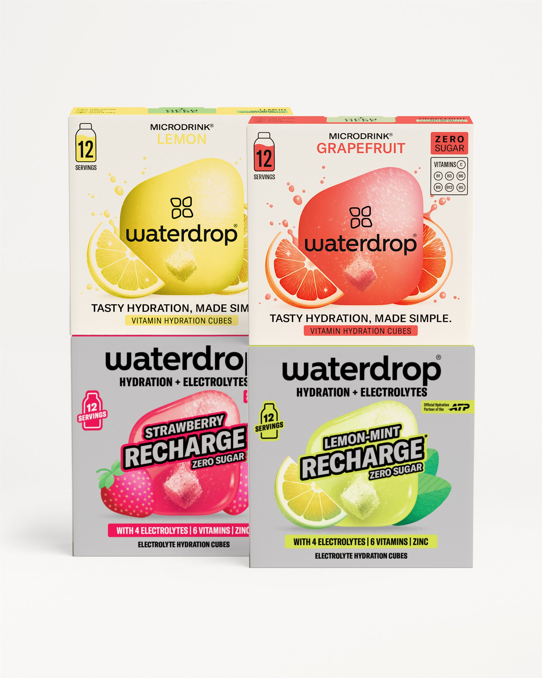 Waterdrop termékdobozok csoportja, köztük Microdrink Lemon, Microdrink Grapefruit, Recharge Strawberry és Recharge Lemon-Mint, mindegyik 12 adaggal, fehér háttéren elrendezve.